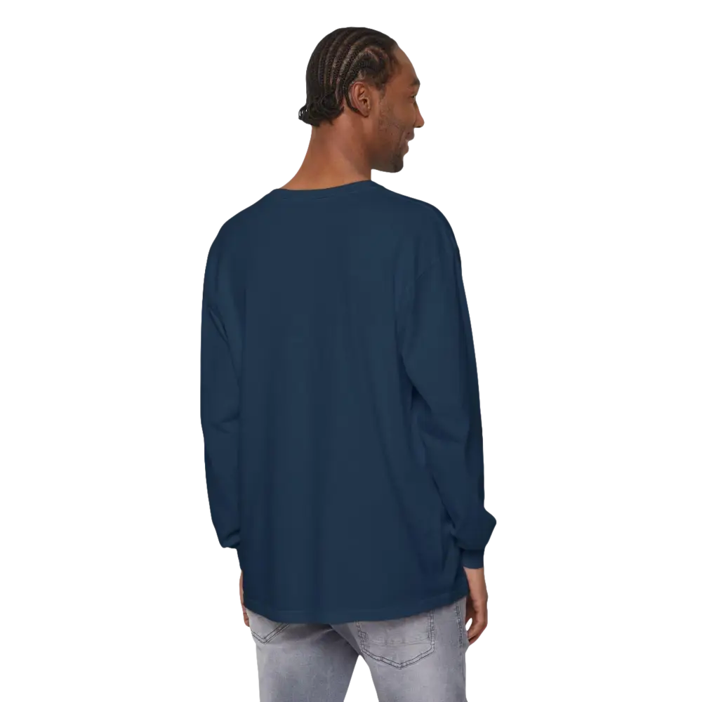 Man in a long-sleeved blue shirt wearing the Adventure Long Sleeve Shirt