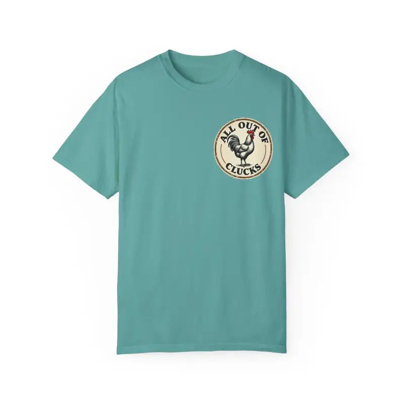 Teal t-shirt featuring a rooster graphic from All Out of Clucks Men’s Casual Collection