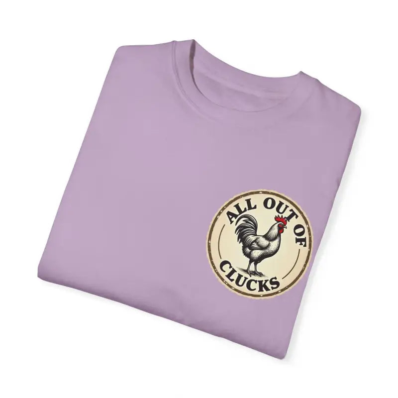 Folded lavender t-shirt featuring chicken graphic from All Out of Clucks Mens Casual Collection