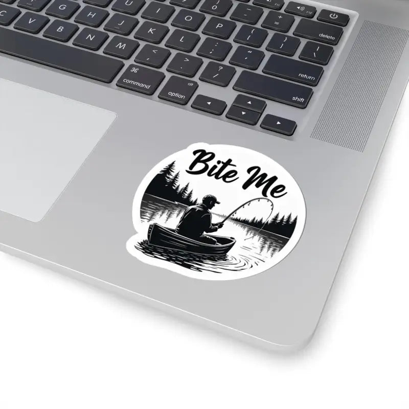 Round sticker featuring a fishing scene from Bite Me Fishing In Canoe Sticker
