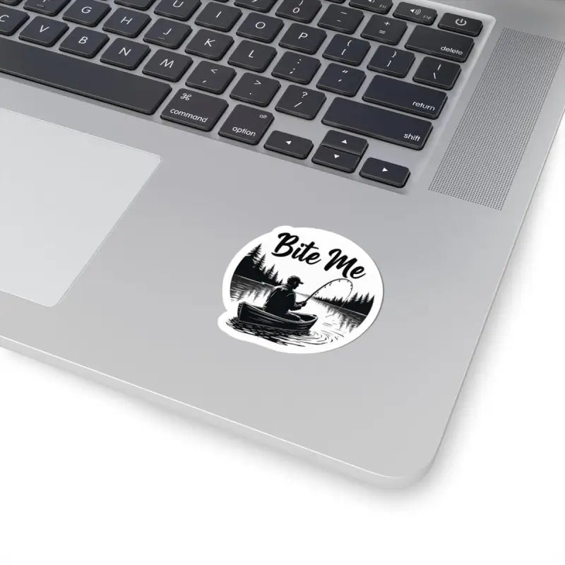 Bite Me Fishing In Canoe Sticker featuring a playful fishing-themed design