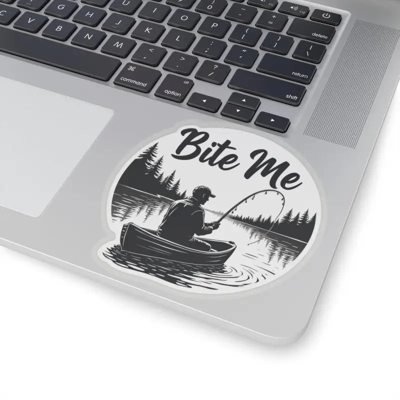 Round sticker featuring a fisherman in a boat for Bite Me Fishing In Canoe Sticker