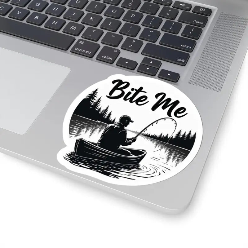Round sticker featuring a scenic fishing illustration in a canoe for Bite Me Fishing