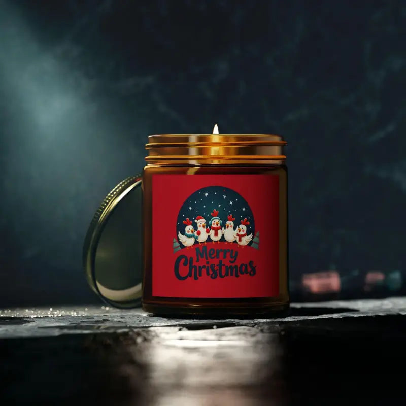 Christmas-themed candle in glass jar from Caroling Chicken, coconut apricot wax decor