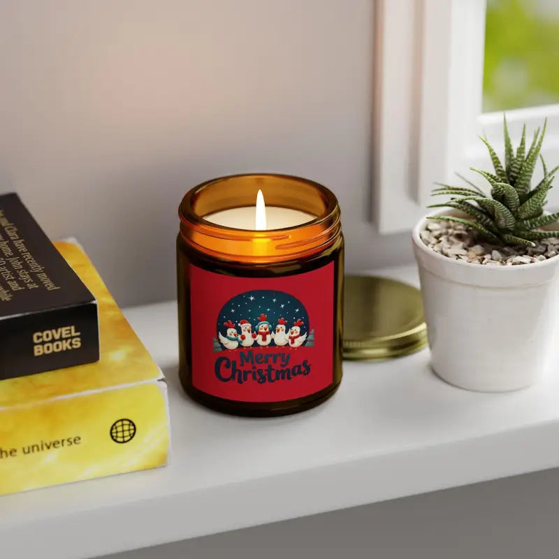 Lit Christmas candle from Caroling Chicken Coconut Apricot Wax home decor collection