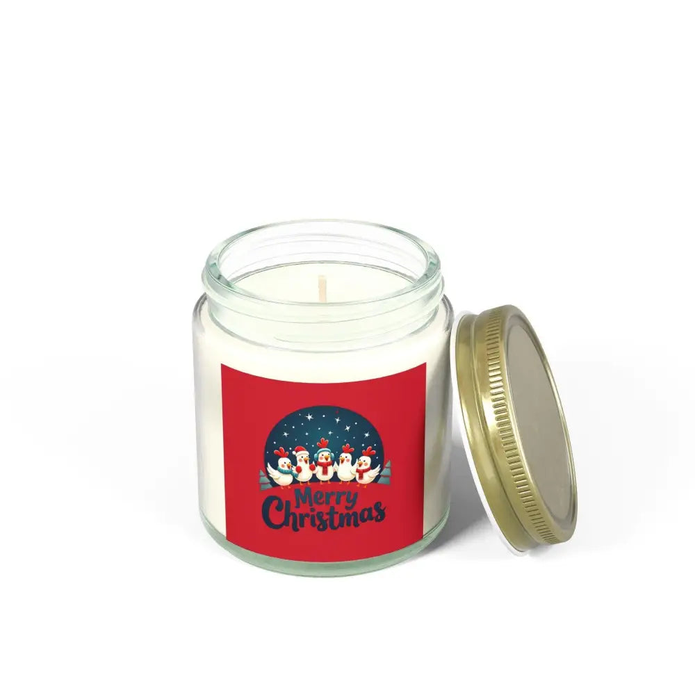 Christmas-themed candle in a glass jar featuring penguins and a caroling chicken