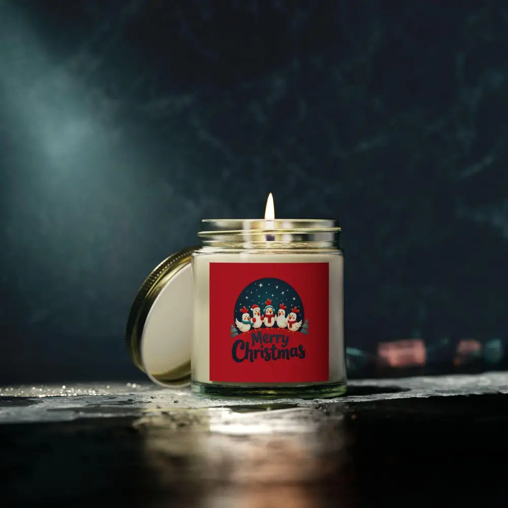 Christmas Candle with Penguins and Caroling Chicken featuring a festive penguin design