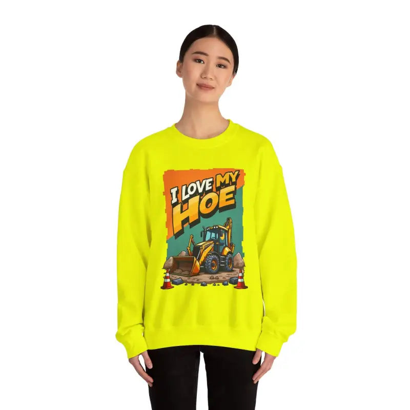 Yellow sweatshirt featuring a construction vehicle graphic for humorous gift options