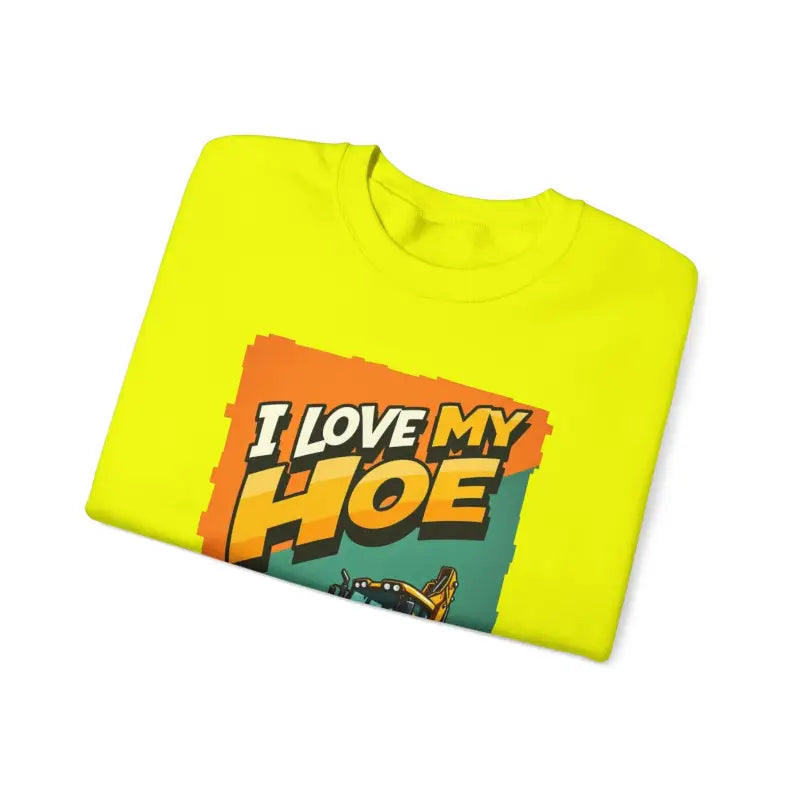 Folded yellow t-shirt with I Love My Hoe graphic for Construction Vehicle Crewneck Sweatshirt