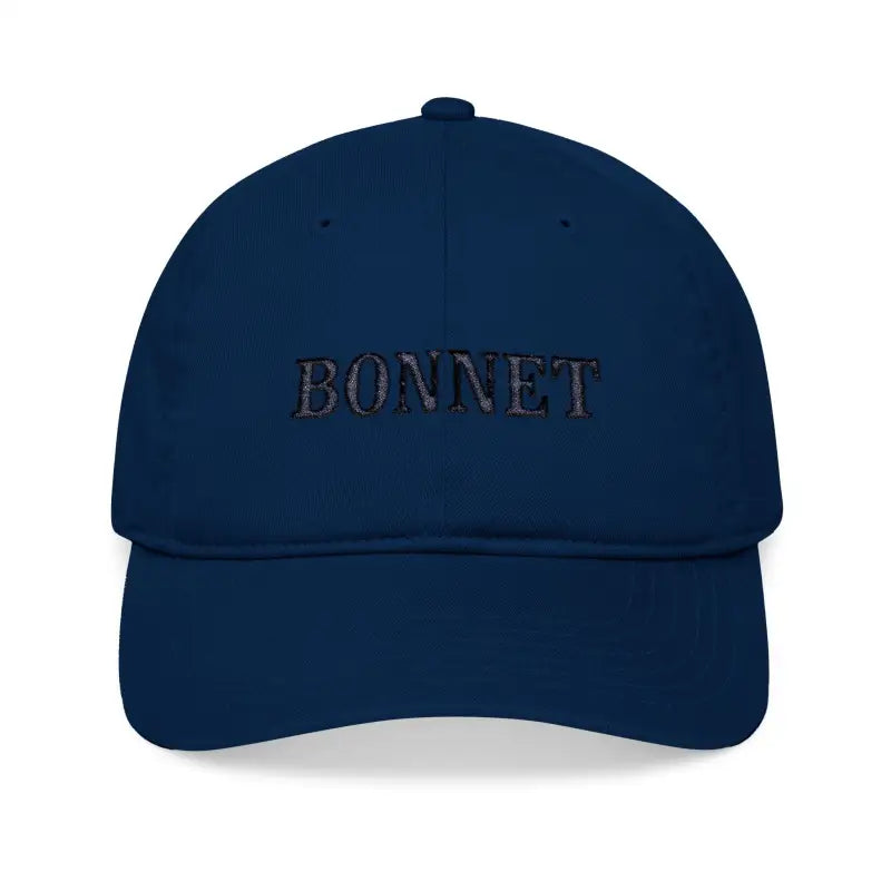 Navy blue embroidered organic baseball cap in bonnet style for stylish outdoor wear