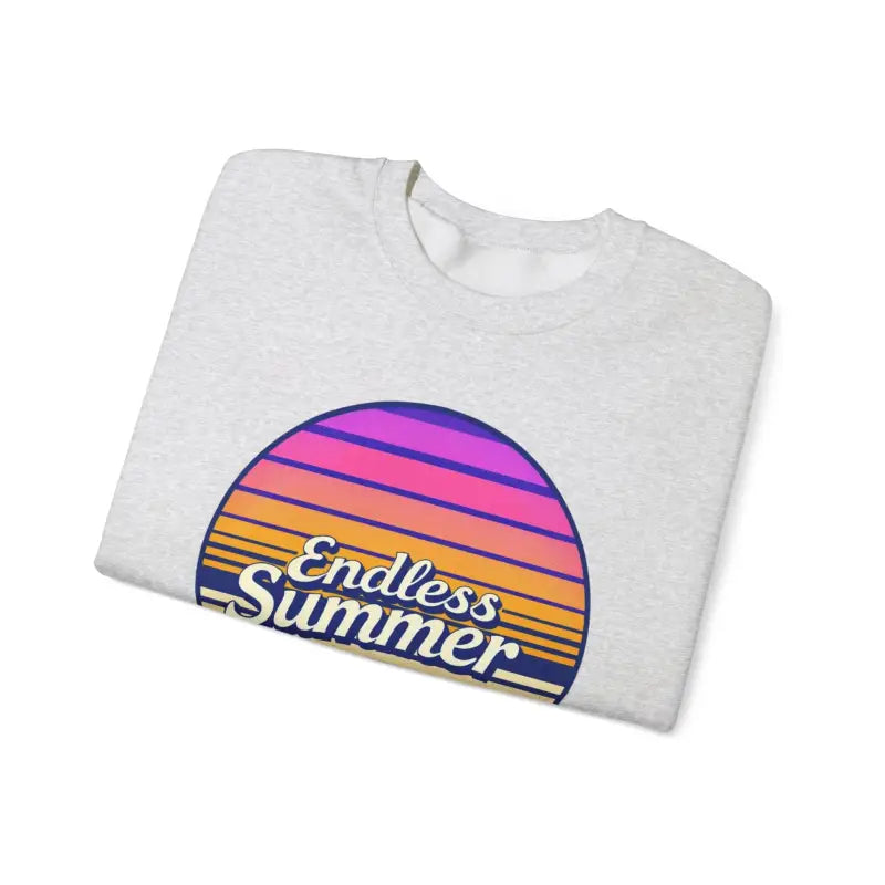 Folded gray t-shirt featuring sunset graphic from Endless Summer Unisex Crewneck Sweatshirt