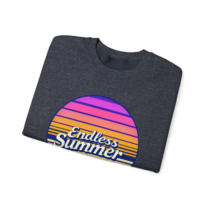 Folded gray t-shirt featuring sunset graphic from Endless Summer Crewneck Sweatshirt