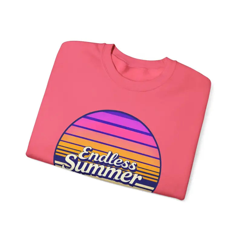 Folded pink t-shirt featuring sunset graphic for Endless Summer Unisex Crewneck Sweatshirt