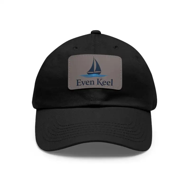 Black baseball cap featuring a sailboat patch from Even Keel Branded Dad Hat collection