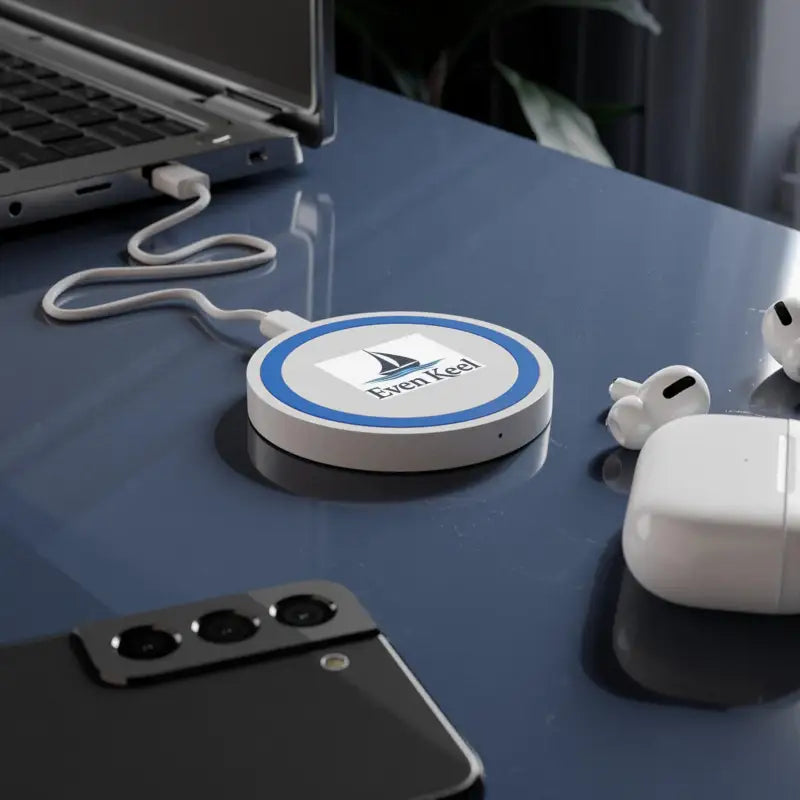 Even Keel Signature Quake Wireless Charging Pad 5W in white color on a smooth surface
