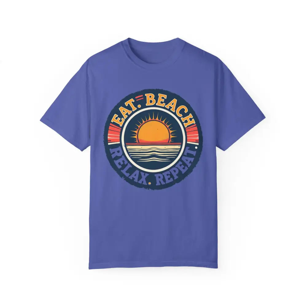 Blue t-shirt featuring beach graphic from Island Reef Unisex Garment Dyed Eat Beach Relax Repeat Tee