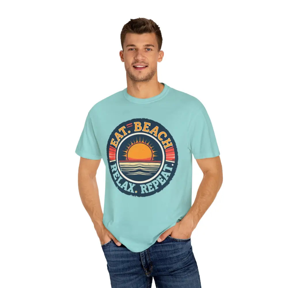 Man modeling Island Reef Unisex Garment Dyed Eat Beach Relax Repeat Tee