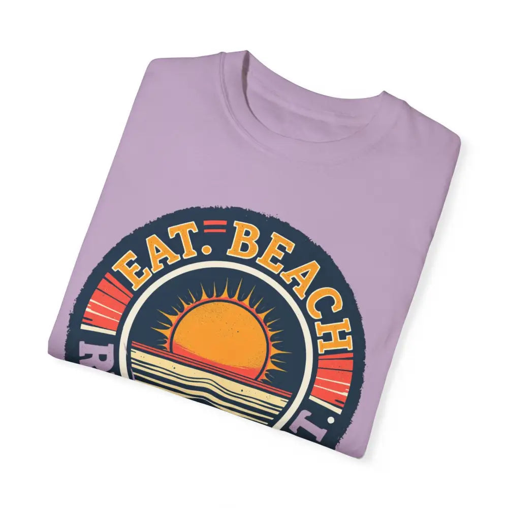 Folded lavender t-shirt from Island Reef Unisex Garment Dyed Eat Beach Relax Repeat Tee