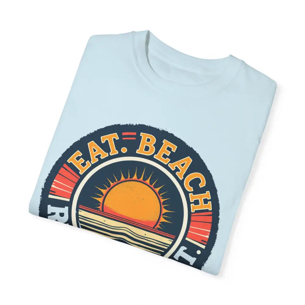 Folded light blue Island Reef Unisex Garment Dyed Eat Beach Relax Repeat Tee
