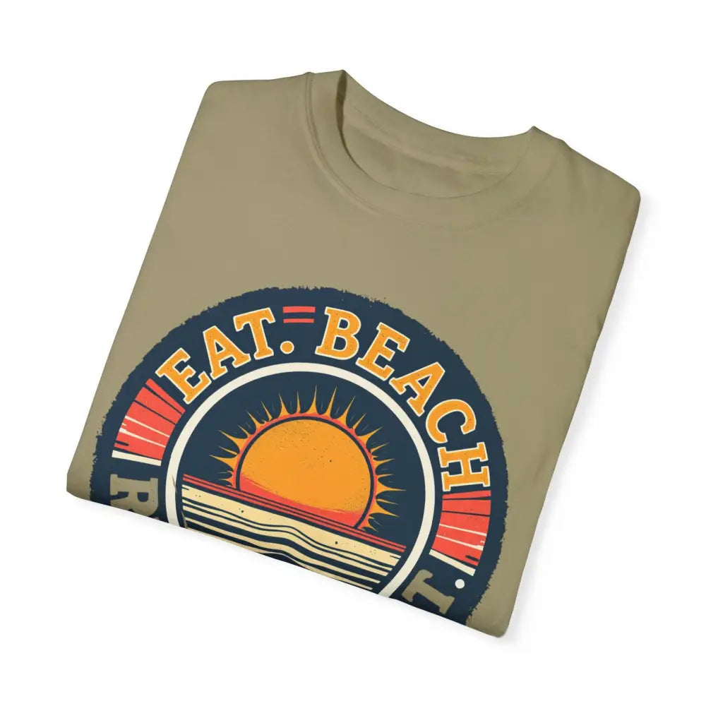 Folded khaki t-shirt from Island Reef Unisex Garment Dyed Eat Beach Relax Repeat Tee