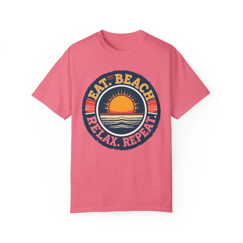 Pink t-shirt featuring a beach graphic from Island Reef Eat Beach Relax Repeat Tee