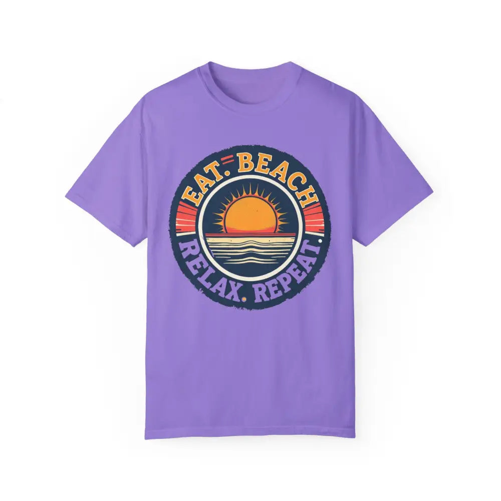 Purple t-shirt featuring a beach graphic from Island Reef Relax Repeat collection