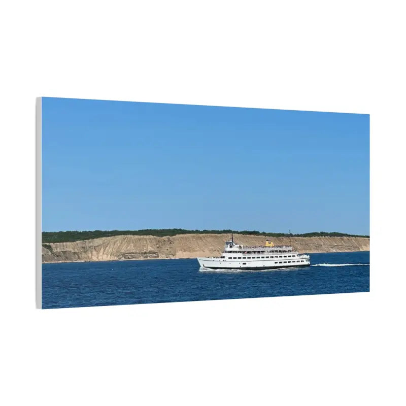 White passenger ferry M/V Anna C sailing near Block Island off scenic bluffs