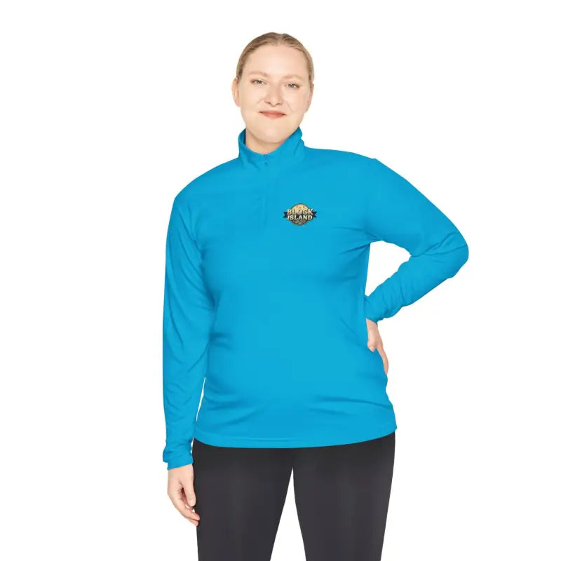 Woman wearing a blue long-sleeved athletic shirt with a gray white blue pullover