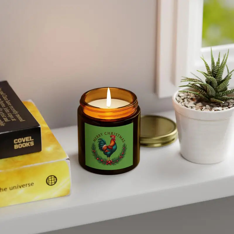 Lit candle with rooster label for Merry Christmas Chicken Candle in coconut apricot wax