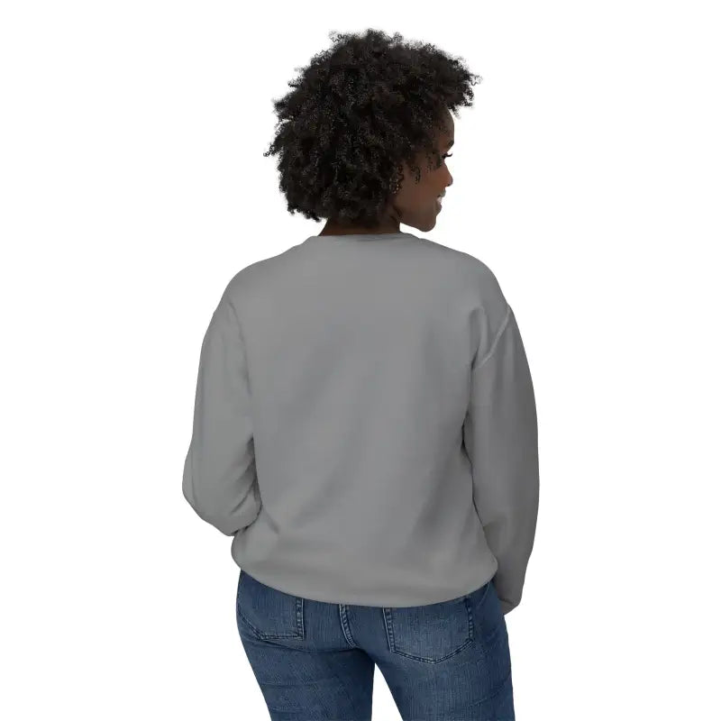 Woman in gray sweatshirt and blue jeans wearing the Narragansett 02882 lightweight crewneck