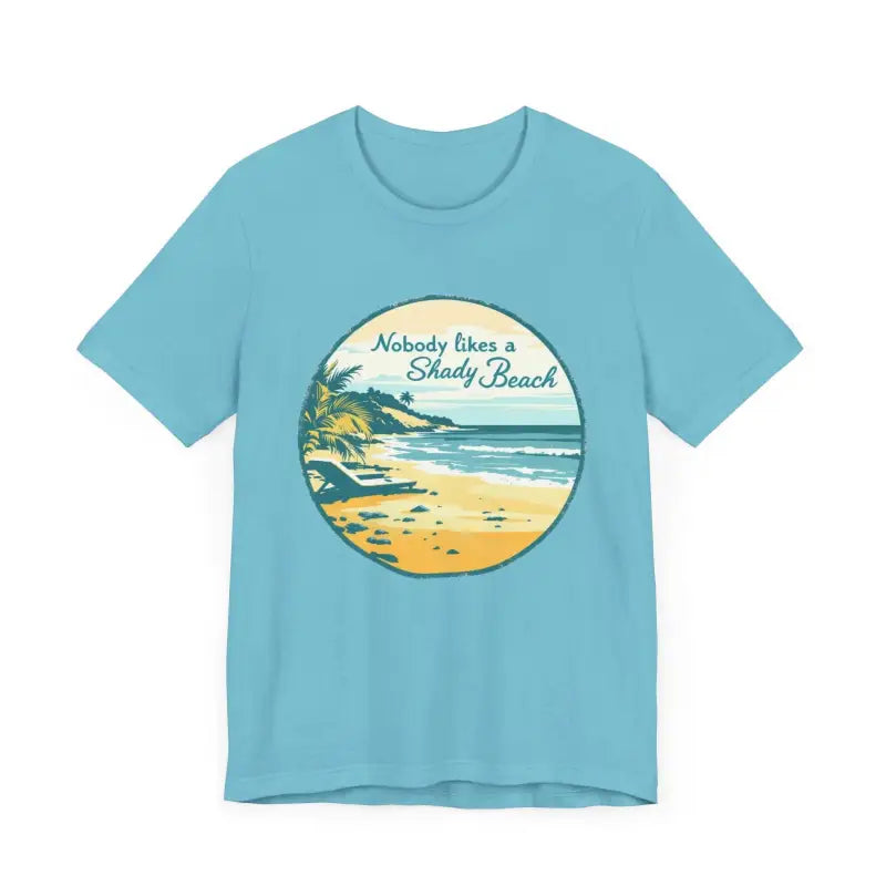 Blue t-shirt featuring a beach graphic for Nobody Likes a Shady Beach Unisex Tee