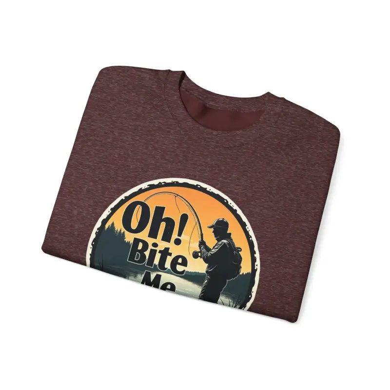 Folded maroon t-shirt featuring fishing graphic from Oh Bite Me Fishing Crewneck Sweatshirt
