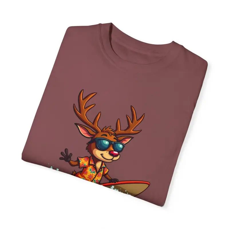 Folded brown t-shirt featuring a cartoon reindeer, named Orange Surfing Reindeer T Shirt