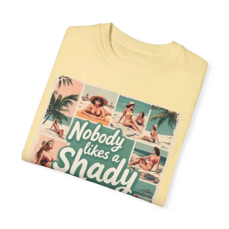 Folded yellow Retro Beach Collage T Shirt featuring a vibrant beach scene graphic