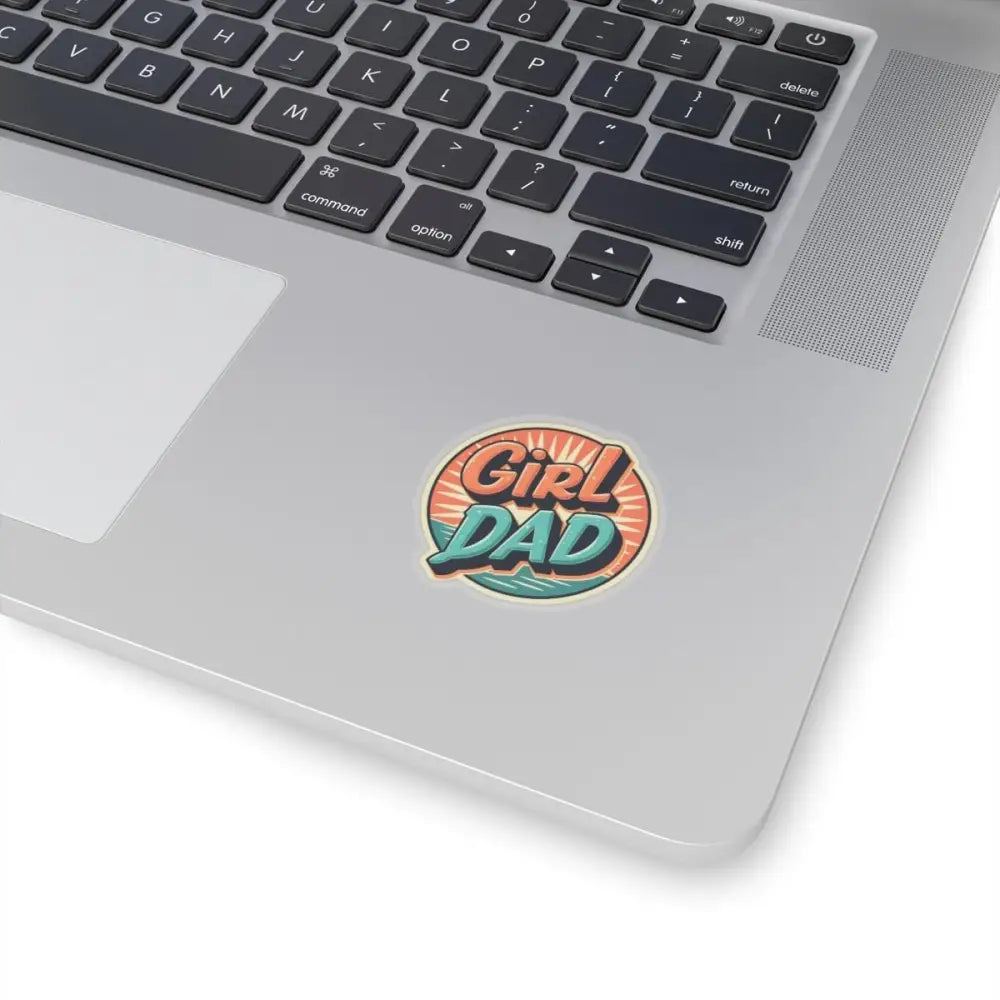 Retro Girl Dad Sticker with Sunburst Design showcased on a laptop for stylish expression