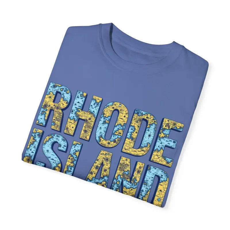Folded blue t-shirt featuring Rhode Island map design in casual coastal style