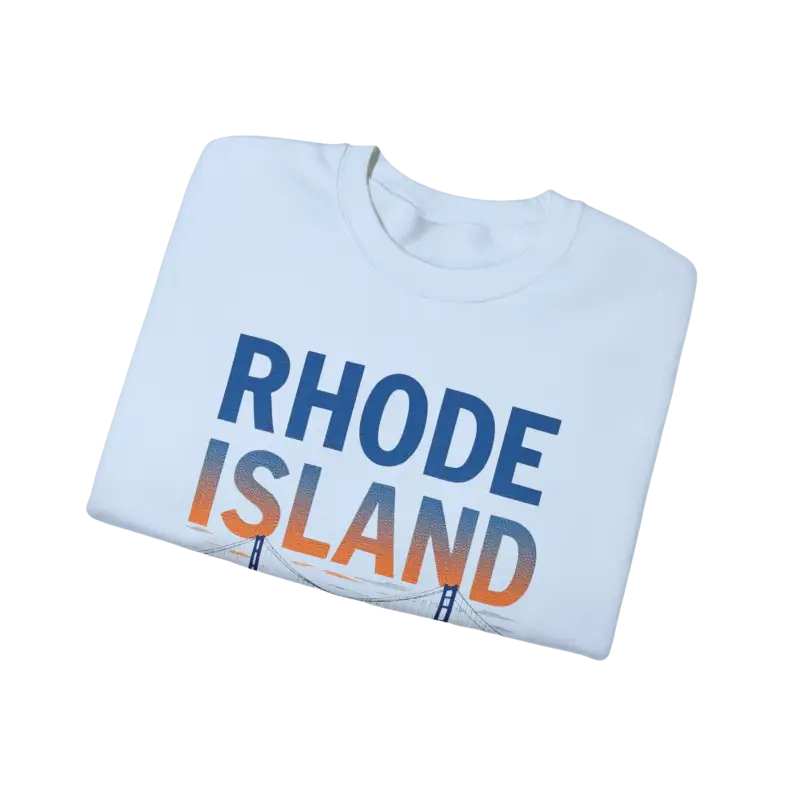 Folded white t-shirt next to Rhode Island Sunset Crewneck Sweatshirt in Black White Pink