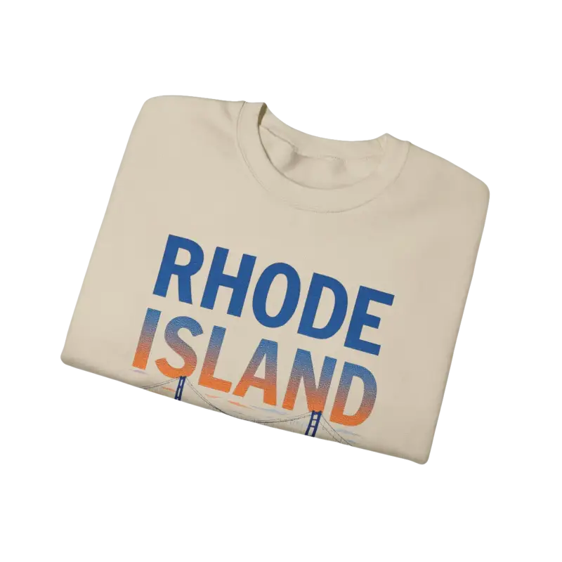 Folded Rhode Island t-shirt next to Rhode Island Sunset Crewneck Sweatshirt in black, white, and pink