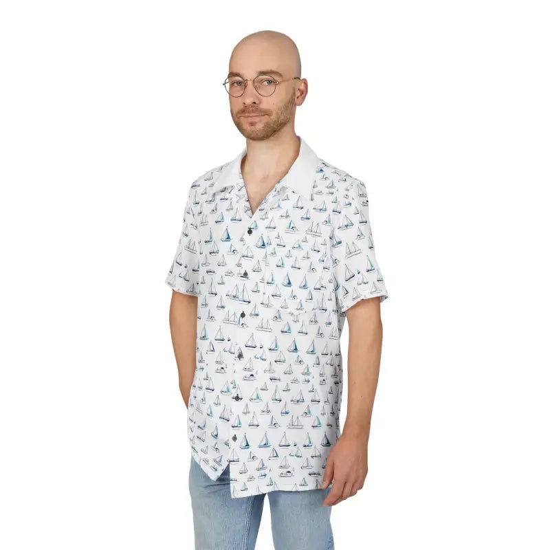 Man in sailboat-patterned shirt showcasing Sailing Vibes Unisex Hawaiian Button-Down Shirt