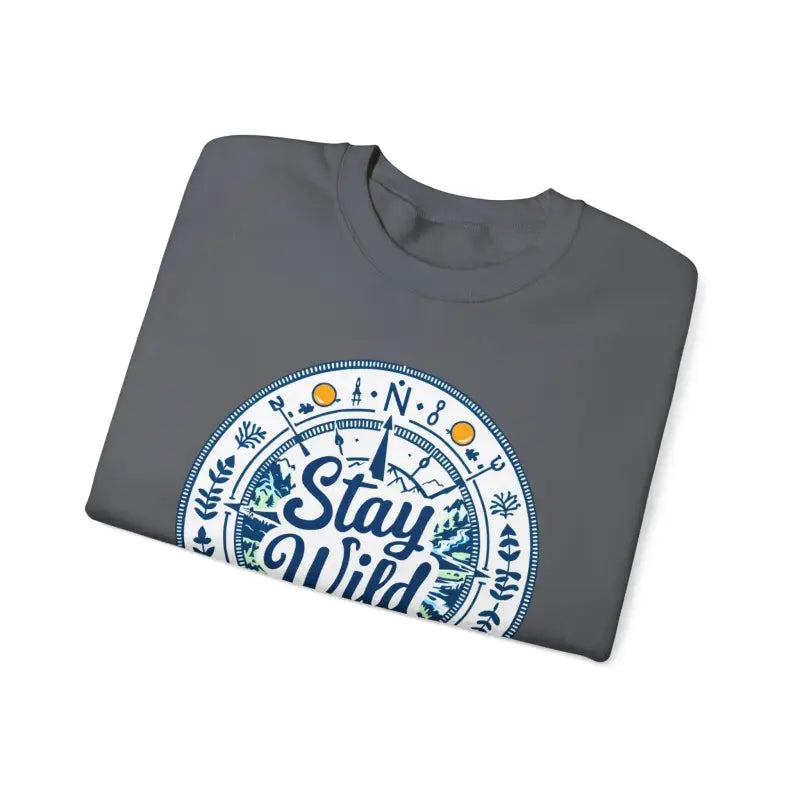 Folded gray t-shirt featuring compass design for Stay Wild Nature Explorer Sweatshirt
