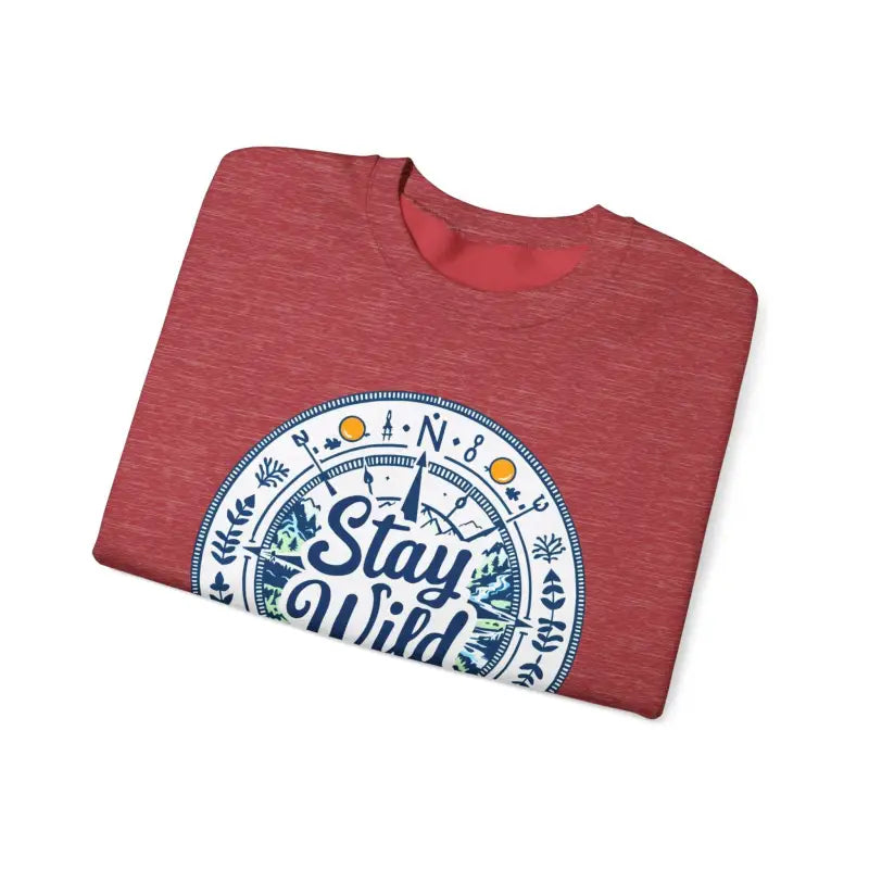 Folded red t-shirt featuring Stay Wild design for nature enthusiasts and outdoor lovers