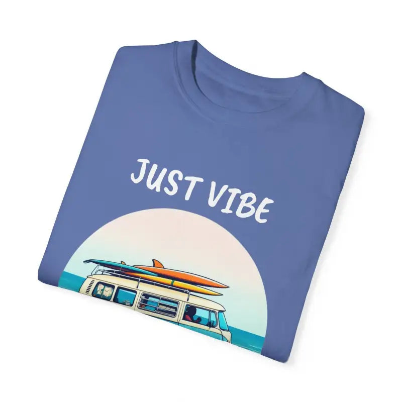 Blue t-shirt featuring van graphics and surfboards for summer vibes