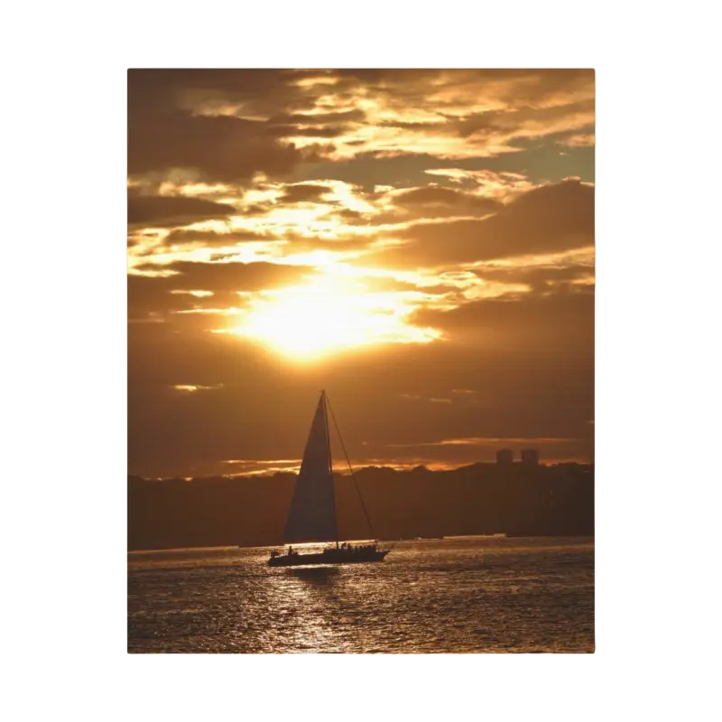 Sailboat silhouetted against a vibrant sunset in Sunset Sailboat Silhouette
