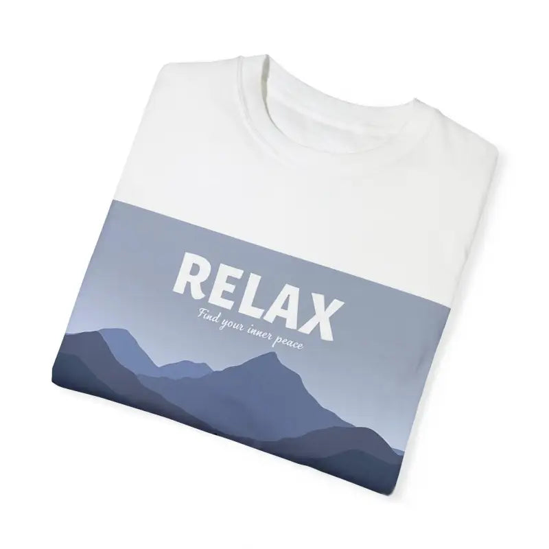 Folded white t-shirt featuring a turquoise mountain graphic for a relaxed style
