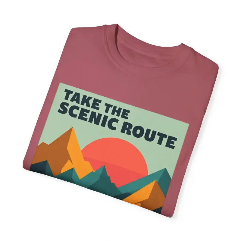 Folded mauve t-shirt showcasing Unisex Mountain Graphic Hiking T Shirt design