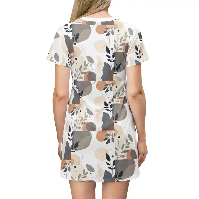 White Abstract Floral T Shirt Dress featuring a vibrant printed short-sleeved design