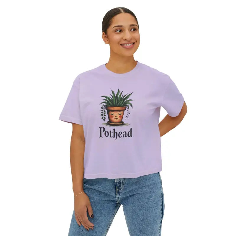 Woman in a Pothead t-shirt featuring a cute planter graphic on a boxy fit