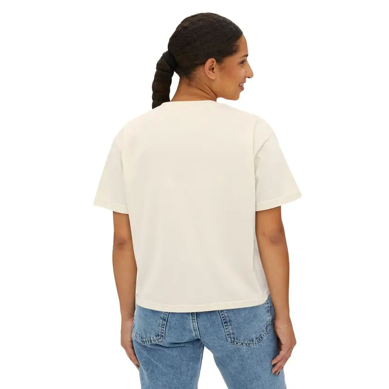 Woman’s cream-colored t-shirt featuring a cute planter graphic in boxy style