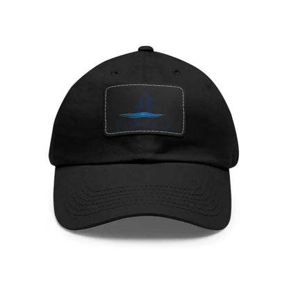 Black Even Keel Dad Hat featuring a unique abstract sailboat patch design