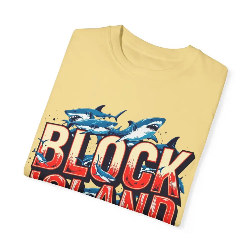 Folded yellow t-shirt featuring shark graphic from Block Island Shark Unisex T Shirt
